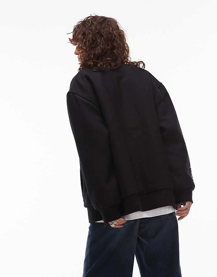 Carhartt WIP Ducks Varsity Jacket In Black For Women 4 Carhartt WIP Ducks Varsity Jacket In Black For Women - Image 4