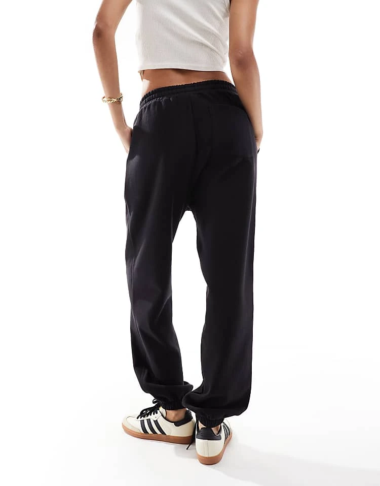Carhartt WIP American Script Joggers In Black For Women 2 Carhartt WIP American Script Joggers In Black For Women - Image 2